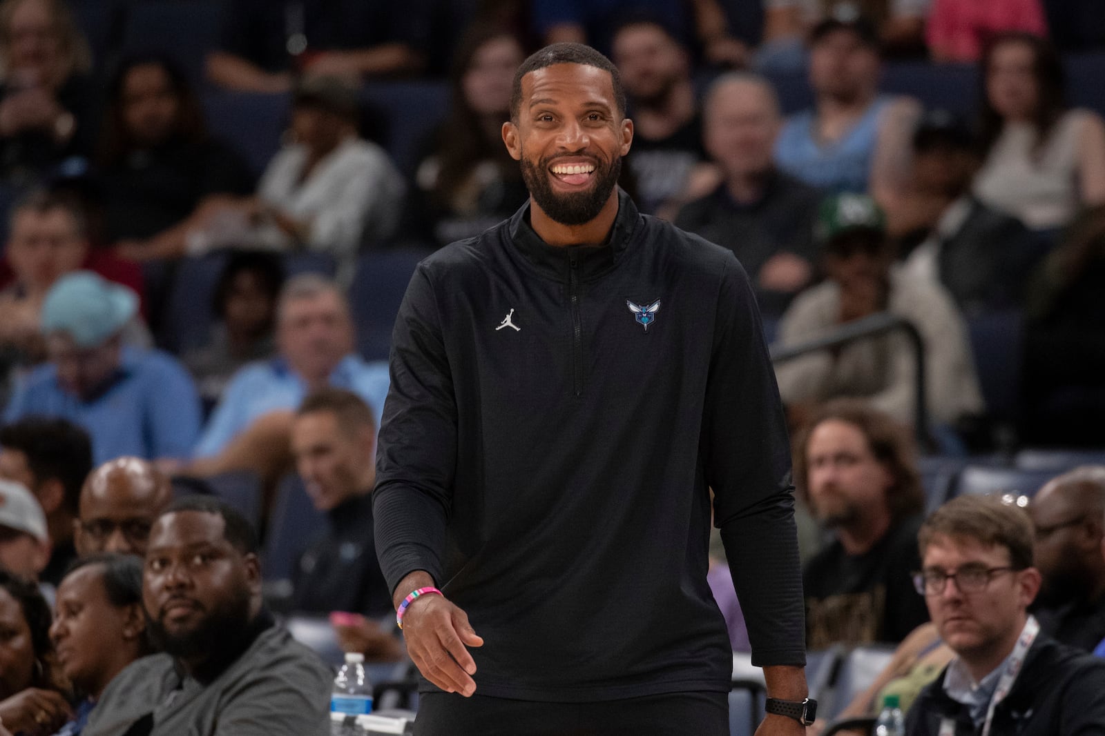 Charlotte Hornets head coach Charles Lee looks on in the first half of a preseason NBA basketball game against the Memphis Grizzlies, Thursday, Oct. 10, 2024, in Memphis, Tenn. (AP Photo/Nikki Boertman)