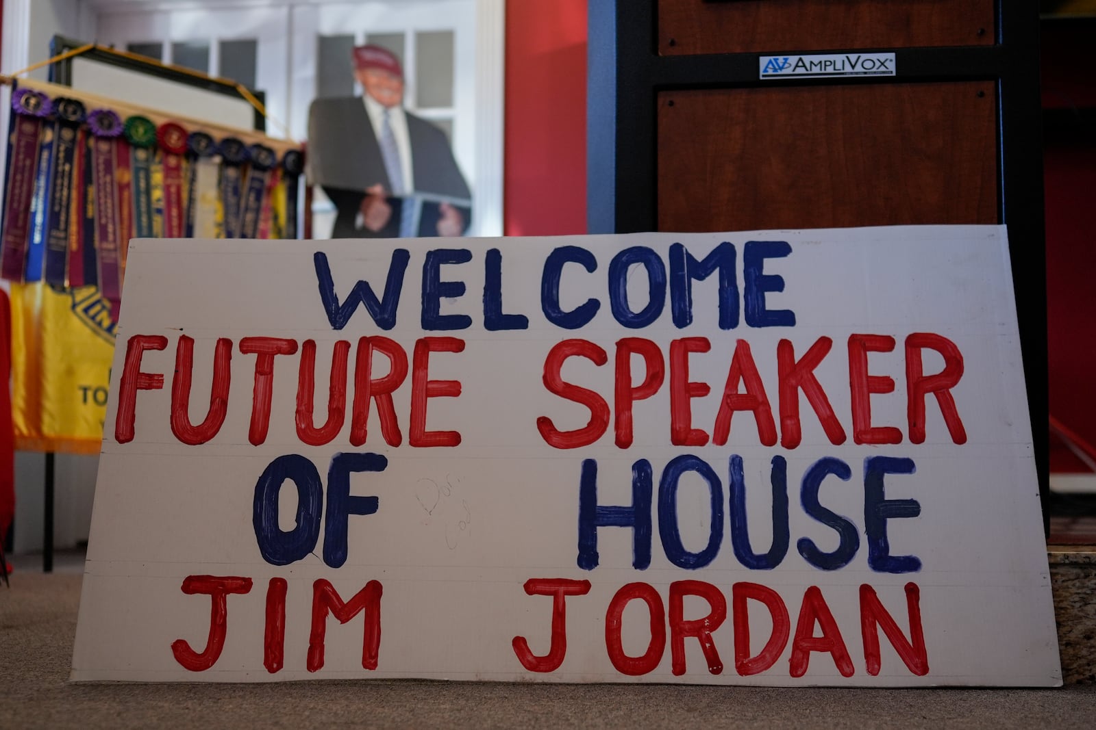 A sign made by Donald Skowron reads "Welcome Future Speaker of House Jim Jordan," and a cardboard cutout of Republican presidential nominee former President Donald Trump, are seen as Rep. Jim Jordan, R-Ohio, speaks at a rally for Rep. Michael Rulli, R-Ohio, at the Mahoning County Republican Party headquarters in Boardman, Ohio, Thursday, Oct. 17, 2024. (AP Photo/Carolyn Kaster)