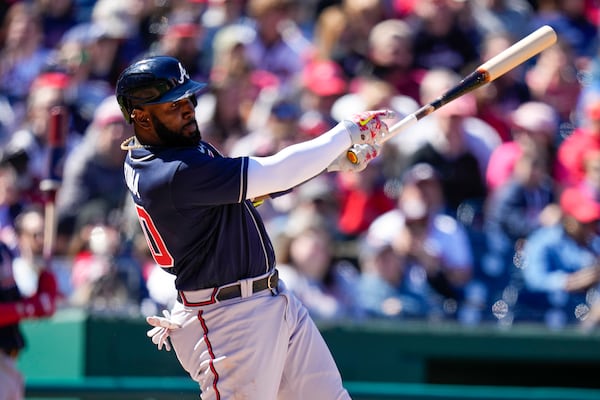 Braves left fielder Marcell Ozuna (20) bats during a baseball game at Nationals Park, Sunday, April 2, 2023, in Washington. (AP Photo/Alex Brandon)