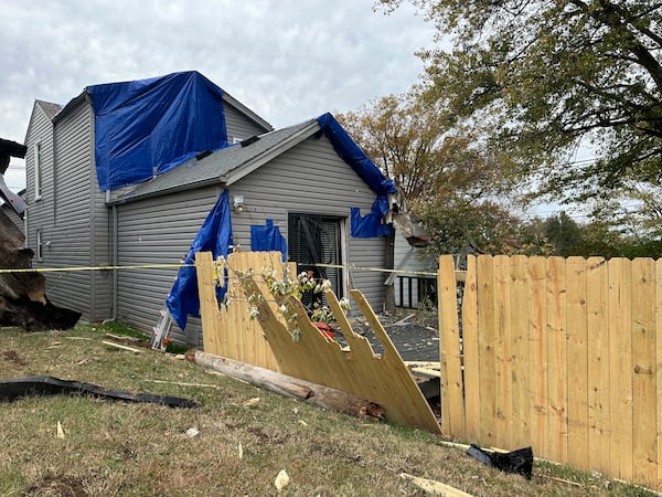 A residential fence near a Louisville, Kentucky, plant that exploded is pictured on Wednesday, Nov. 13, 2024. (AP Photo/Dylan Lovan)