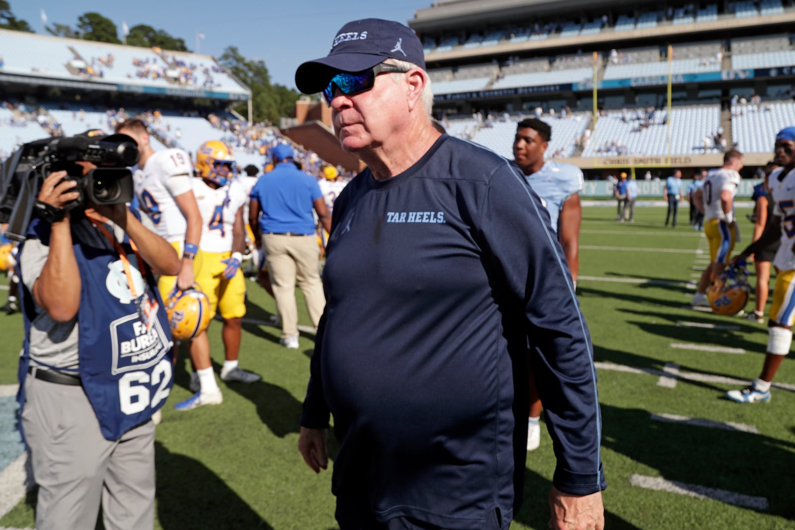 North Carolina head coach Mack Brown walks off the field after a loss to Pittsburgh in an NCAA college football game Saturday, Oct. 5, 2024, in Chapel Hill, N.C. (AP Photo/Chris Seward)