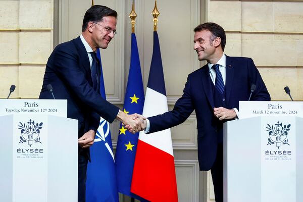 French President Emmanuel Macron and NATO Secretary General Mark Rutte shake hands during their meeting at the Elysee Palace, in Paris, France, Tuesday, Nov. 12, 2024. (Manon Cruz/ Pool Photo via AP)