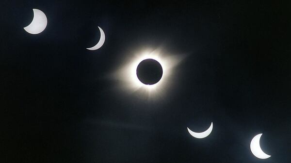 A multiple exposure photograph shows the progress of a solar eclipse over Xochicalco, Mexico in 1991. The sequence begins at the upper left.