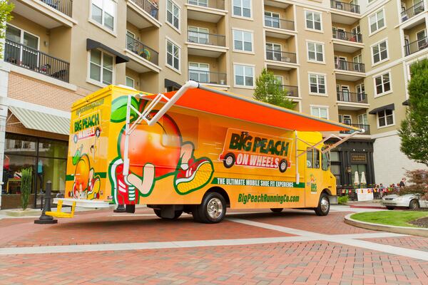 Big Peach Running Co. often uses the company’s “Big Peach on Wheels” retail truck to sell its running apparel. (Courtesy of Big Peach Running Co.)