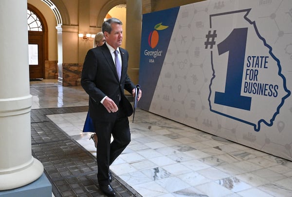 Gov. Brian Kemp walks to the podium before he makes remarks on an executive order during a news conference at the Georgia State Capitol building. (Hyosub Shin / Hyosub.Shin@ajc.com)