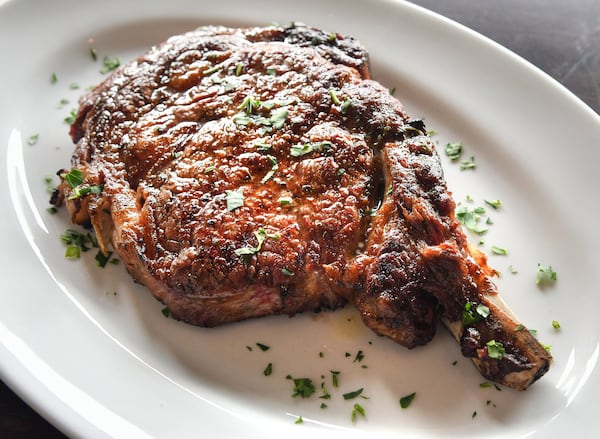 The 22 oz. Bone-In-Ribeye at Bottles & Bones. CONTRIBUTED BY CHRIS HUNT PHOTOGRAPHY