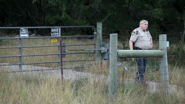 A Comal County Sheriff deputy guards the entrance to the home of Devin P. Kelley, the alleged shooter in the Sutherland Springs church shooting, in New Braunfels on Monday November 6, 2017.  JAY JANNER / AMERICAN-STATESMAN