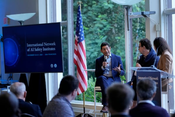 Tino Cuéllar, President of the Carnegie Endowment for International Peace, middle, speaks on a panel with Dario Amodei, CEO & Co-Founder of Anthropic, second from right, and Elizabeth Kelly, Director of the U.S. AI Safety Institute, at the convening of the International Network of AI Safety Institutes at the Golden Gate Club at the Presidio in San Francisco, Wednesday, Nov. 20, 2024. (AP Photo/Jeff Chiu)