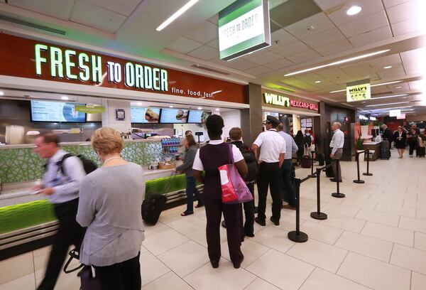 Multiple restaurants line Concourse B at Atlanta’s Hartsfield-Jackson International Airport. (Curtis Compton/ AJC 2018 file)