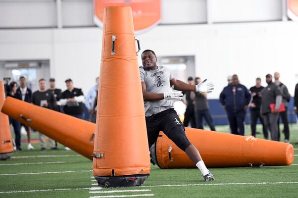 Defensive end Marlon Davidson works out during Auburn NCAA college football Pro Day Friday, March 6, 2020, in Auburn, Ala. (AP Photo/Julie Bennett)