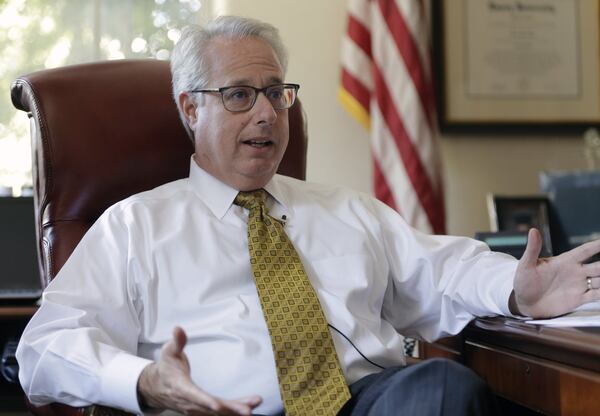 Sam Olens photographed in the attorney general’s office, which he held from 2011 through October. BOB ANDRES /BANDRES@AJC.COM