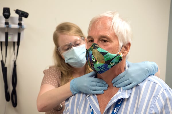 Jack Krost participates in Phase 3 of the COVID-19 vaccine trial at Emory University’s Hope Clinic. He’s with Laura Clegg, clinical research nurse at the Hope Clinic.