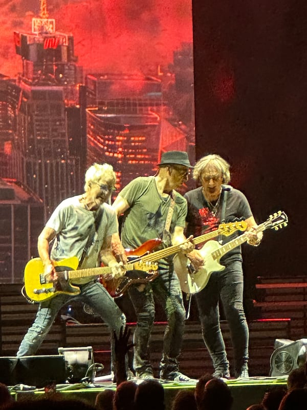 REO Speedwagon during "Ridin' The Storm Out" at Ameris Bank Amphitheatre in Alpharetta August 17, 2024. RODNEY HO/rho@ajc.com