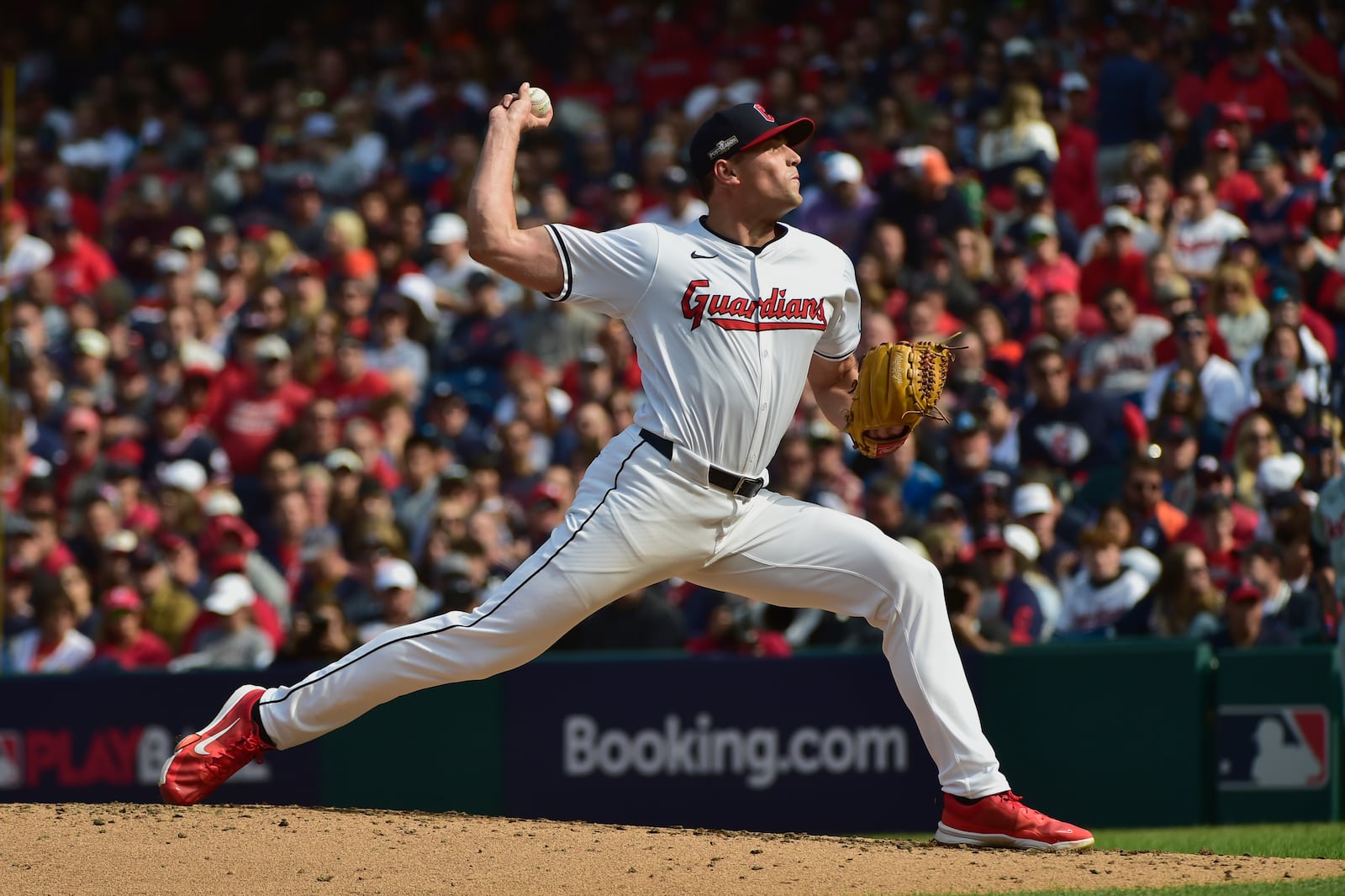 Cleveland Guardians' Cade Smith pitches in the third inning during Game 5 of baseball's American League Division Series against the Detroit Tigers, Saturday, Oct. 12, 2024, in Cleveland. (AP Photo/Phil Long)