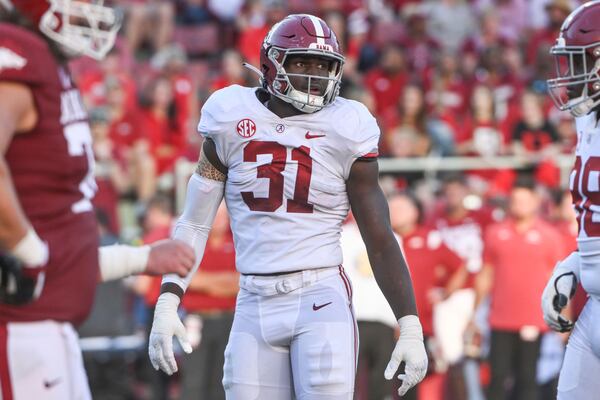 Alabama linebacker Will Anderson Jr. (31) gets ready to run a play against Arkansas during an NCAA college football game Saturday, Oct. 1, 2022, in Fayetteville, Ark. (AP Photo/Michael Woods)