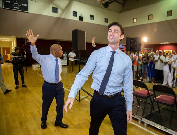 Democratic Senate candidate Jon Ossoff and Rep. John Lewis wave to the crowd at the start of a voter registration rally at the MLK Recreation Center on Saturday, September 28, 2019. STEVE SCHAEFER / SPECIAL TO THE AJC