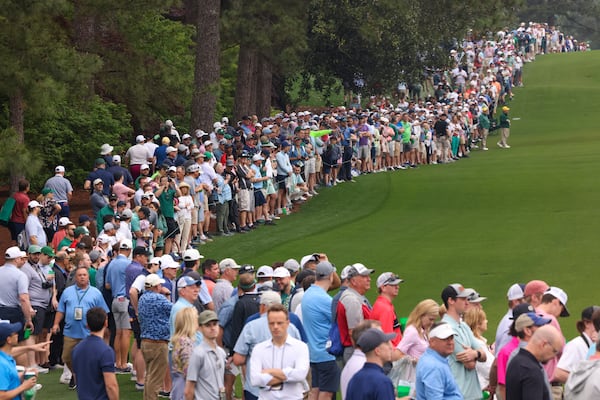 Patrons line the eighth fairway as they follow the Tiger Woods group during the practice round for the 2023 Masters Tournament at Augusta National Golf Club, Tuesday, April 4, 2023, in Augusta, Ga. Jason Getz / Jason.Getz@ajc.com)
