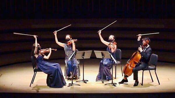 Emily Daggett Smith (left) is the new violinist with the Vega Quartet.