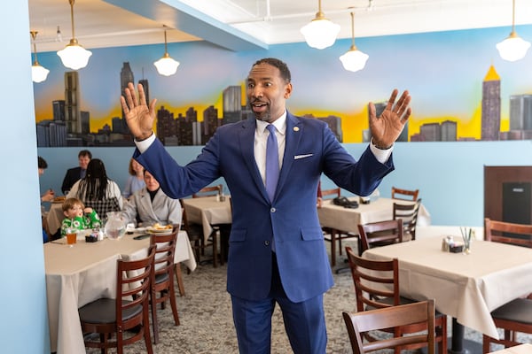 Mayor Andre Dickens speaks to press in a newly reopened dining room at Mary Mac’s restaurant in Atlanta on Thursday, February 20, 2025. The iconic restaurant temporarily closed in 2024 after heavy storm damage. (Arvin Temkar / AJC)