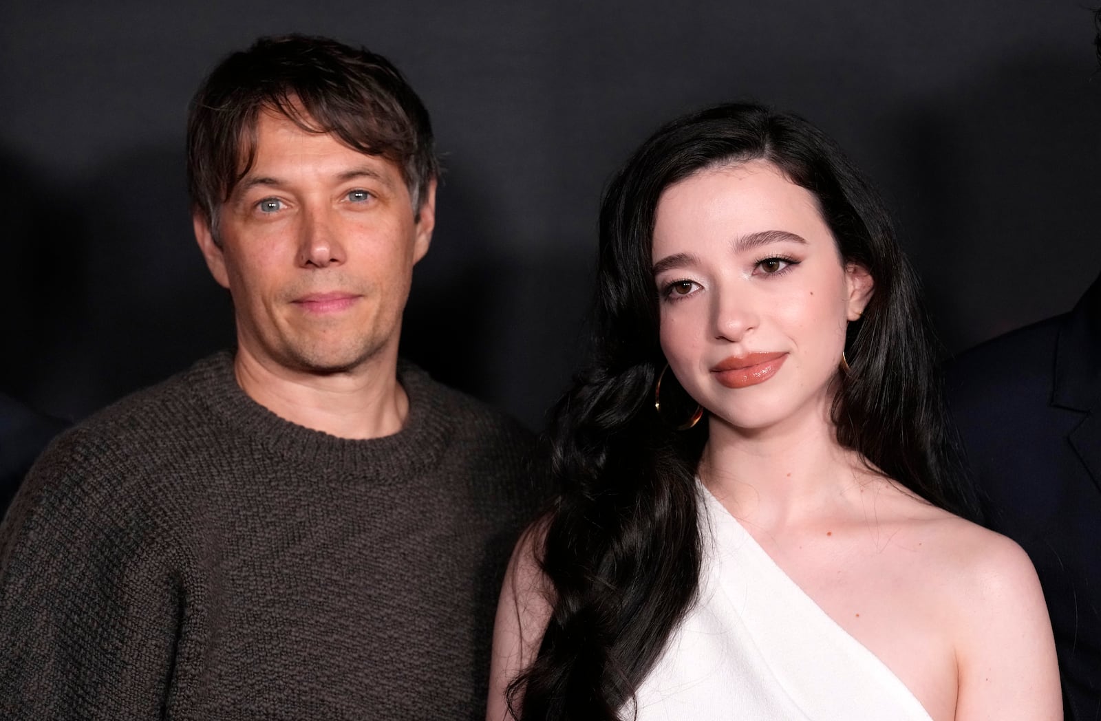 Sean Baker, left, writer/director of "Anora," and cast member Mikey Madison pose together at the premiere of the film, Tuesday, Oct. 1, 2024, at the Vista Theatre in Los Angeles. (AP Photo/ Chris Pizzello)