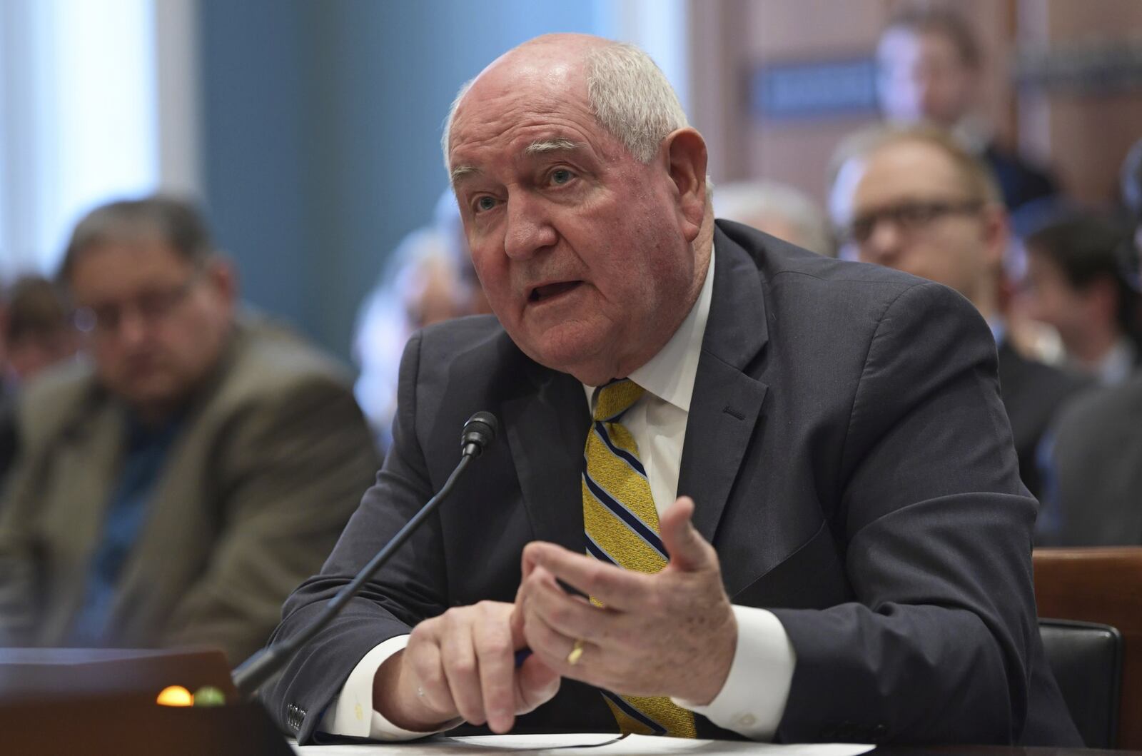 U.S. Agriculture Secretary Sonny Perdue, a former governor of Georgia, was ordered in October 2020 to reimburse the federal government for a trip announcing an extension of the Food Box Program in a speech that included comments backing then-President Donald Trump’s reelection. The program, itself, has now drawn criticism from a U.S. House subcommittee that says it was mismanaged and awarded $96 million in contracts to underqualified companies. (AP Photo/Susan Walsh)