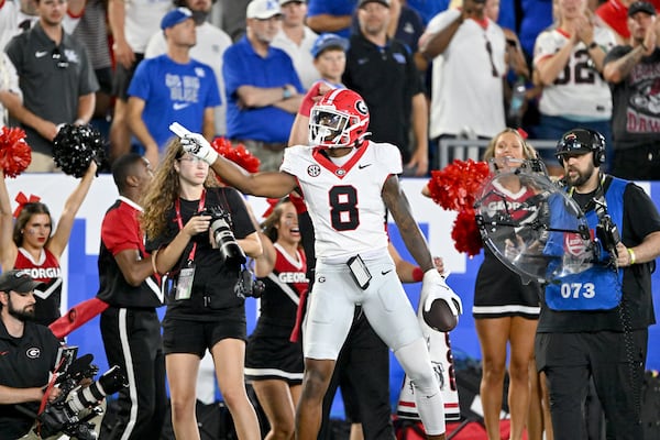 Georgia wide receiver Colbie Young (8) celebrates after catching a long pass during the second half in an NCAA football game at Kroger Field, Saturday, September 14, 2024,  in Lexington, Kentucky. Georgia won 13-12 over Kentucky. (Hyosub Shin / AJC)