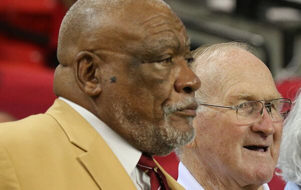 Falcons legends Claude Humphrey (left) and Tommy Nobis were fixtures on Atlanta's early teams. (Curtis Compton/AJC)