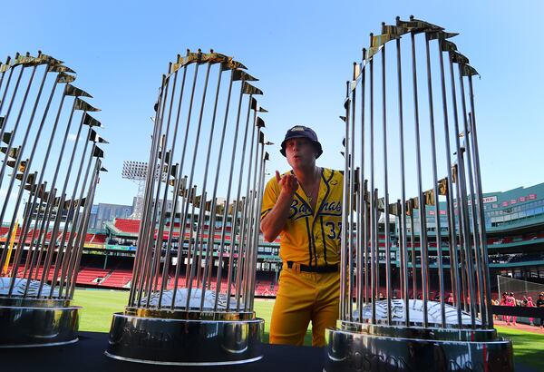 The Savannah Bananas  took their World Tour to a sold-out Fenway Park on Saturday, June 8, 2024, as they played the Party Animals  before over 37,000 fans in an entertaining take on traditional big league baseball.  Bananas Ethan Skuija blows a kiss at the three Red Sox World Series trophies on display in the outfield. “How do we get one of these?” Skuija said as he chuckled. (John Tlumacki/Boston Globe)