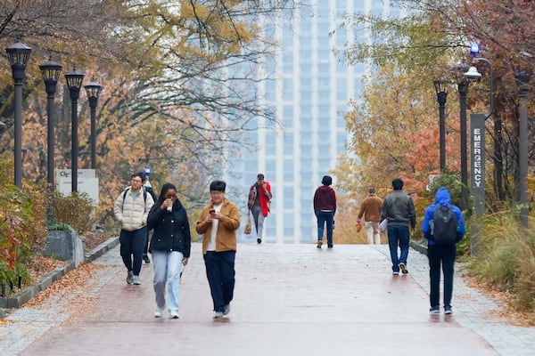 Georgia Tech students were spotted walking through campus near the Clough Undergraduate Commons on Monday, December 9, 2024. Georgia Tech now has the highest number of enrolled students in the state. 
(Miguel Martinez / AJC)