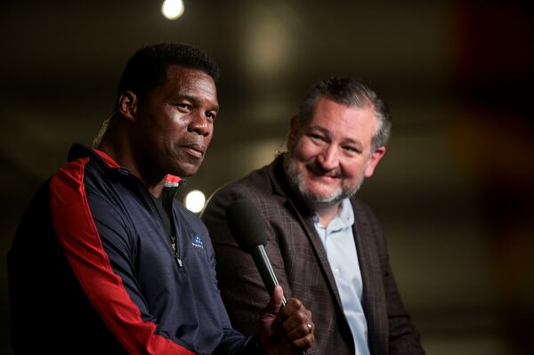 Republican U.S. Senate candidate Herschel Walker, left, and U.S. Sen. Ted Cruz of Texas campaigned together Thursday in Canton. Cruz urged President Joe Biden to "come campaign alongside Raphael Warnock." (Daniel Varnado/For the AJC)