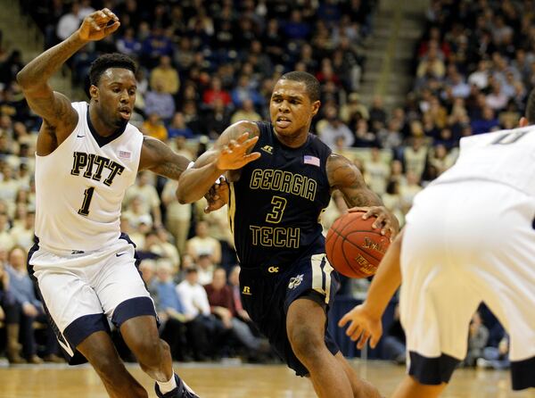 PITTSBURGH, PA - JANUARY 06: Marcus Georges-Hunt #3 of the Georgia Tech Yellow Jackets drives the court against Jamel Artis #1 of the Pittsburgh Panthers during the game at Petersen Events Center on January 6, 2016 in Pittsburgh, Pennsylvania. (Photo by Justin K. Aller/Getty Images)