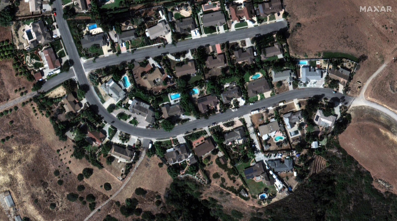 This satellite image released by Maxar Technologies shows houses in Camarillo, Calif., before being damaged by the fire, on Thursday Nov. 7, 2024. (Satellite image ©2024 Maxar Technologies via AP)