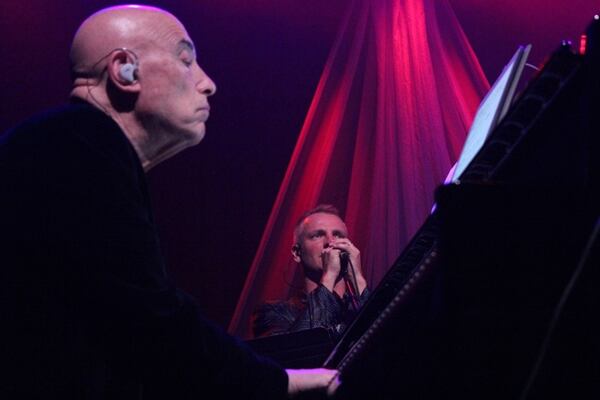  Mike Garson (foreground) studies his sheet music while Joe Sumner sings backup. Photo: Melissa Ruggieri/AJC