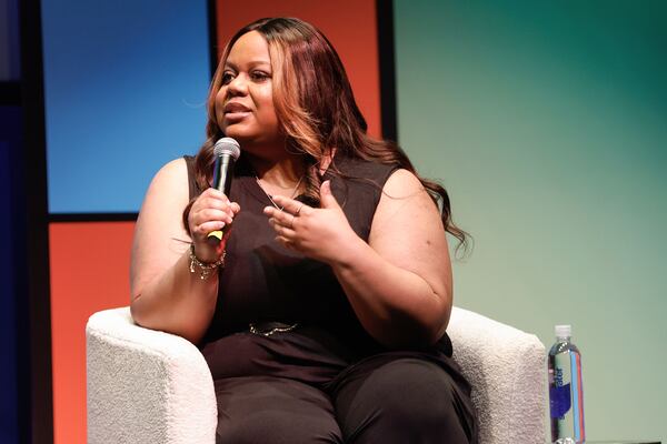 Internet personality Tareasa Johnson, known online as Reesa Teesa speaks to media personality Anisa Brenee on a panel about storytelling during CultureCon on the campus of Clark Atlanta University on Friday, April 12, 2024. Johnson went viral after creating the 50-part TikTok series “Who TF Did I Marry” where she talks about her six-month marriage to a man that she says was a pathological liar. (Natrice Miller/ AJC)