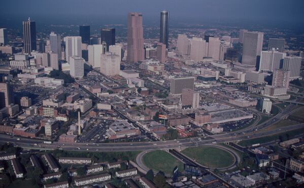 The construction of the Downtown Connector divided downtown Atlanta  from the historic Sweet Auburn neighborhood (at the bottom of the photo), which was the cultural and business center for African Americans in Atlanta. Photo by Cotten Alston, Courtesy of Kenan Research Center at the Atlanta History Center.