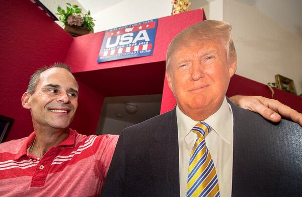 President Donald J. Trump fan, Gene Huber, Boynton Beach, keeps a life-sized cardboard cutout of the President at his home in Boynton Beach, Florida on February 19, 2017. (Allen Eyestone / The Palm Beach Post)