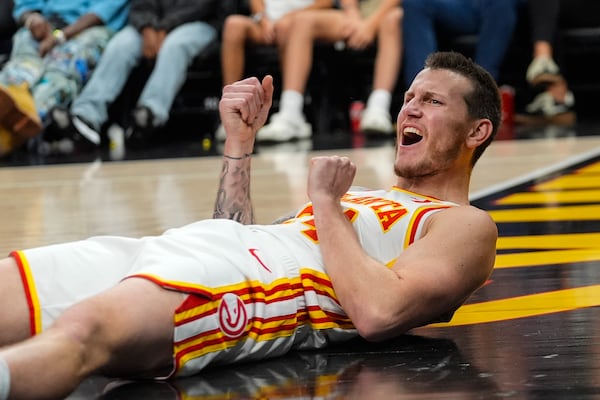 Atlanta Hawks guard Garrison Mathews (24) reacts after being fouled during the second half of an NBA basketball game against the Chicago Bulls Saturday, Nov. 9, 2024, in Atlanta. (AP Photo/ John Bazemore)