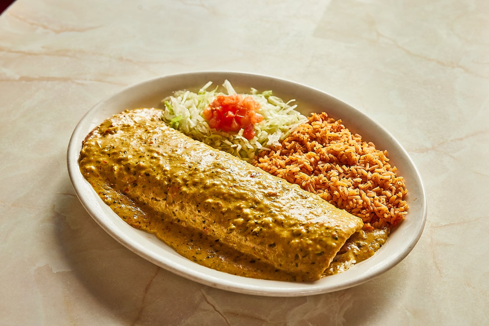 The Chuy's Big As 'Yo Face Burrito Challenge asks competitors to finish two burritos in one sitting. / Courtesy of Chuy's