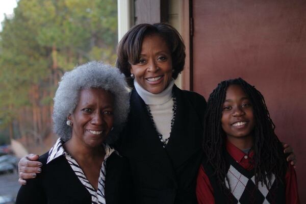 Grandmother Ruby Cox, Malena Cunningham Anderson and Malik Kofi HANDOUT