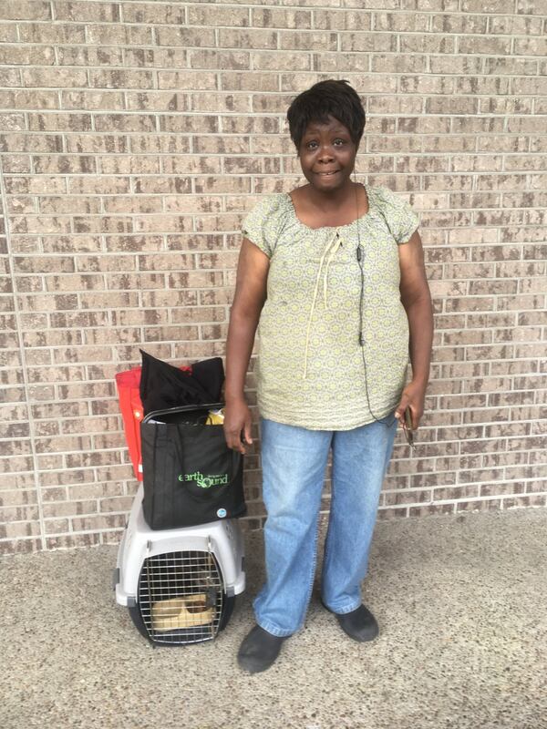 Trina Greene escaped Hurricane Matthew with her cat and little else. She and Kitty evacuated ahead of Irma. Photo: Jennifer Brett