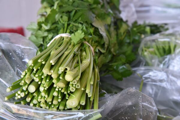 Another Georgia crop arriving at restaurants earlier than normal this season because of the mild winter is parsley, like this fresh and lovely bunch at Turnip Truck on Thursday, March 9, 2017. HYOSUB SHIN / HSHIN@AJC.COM