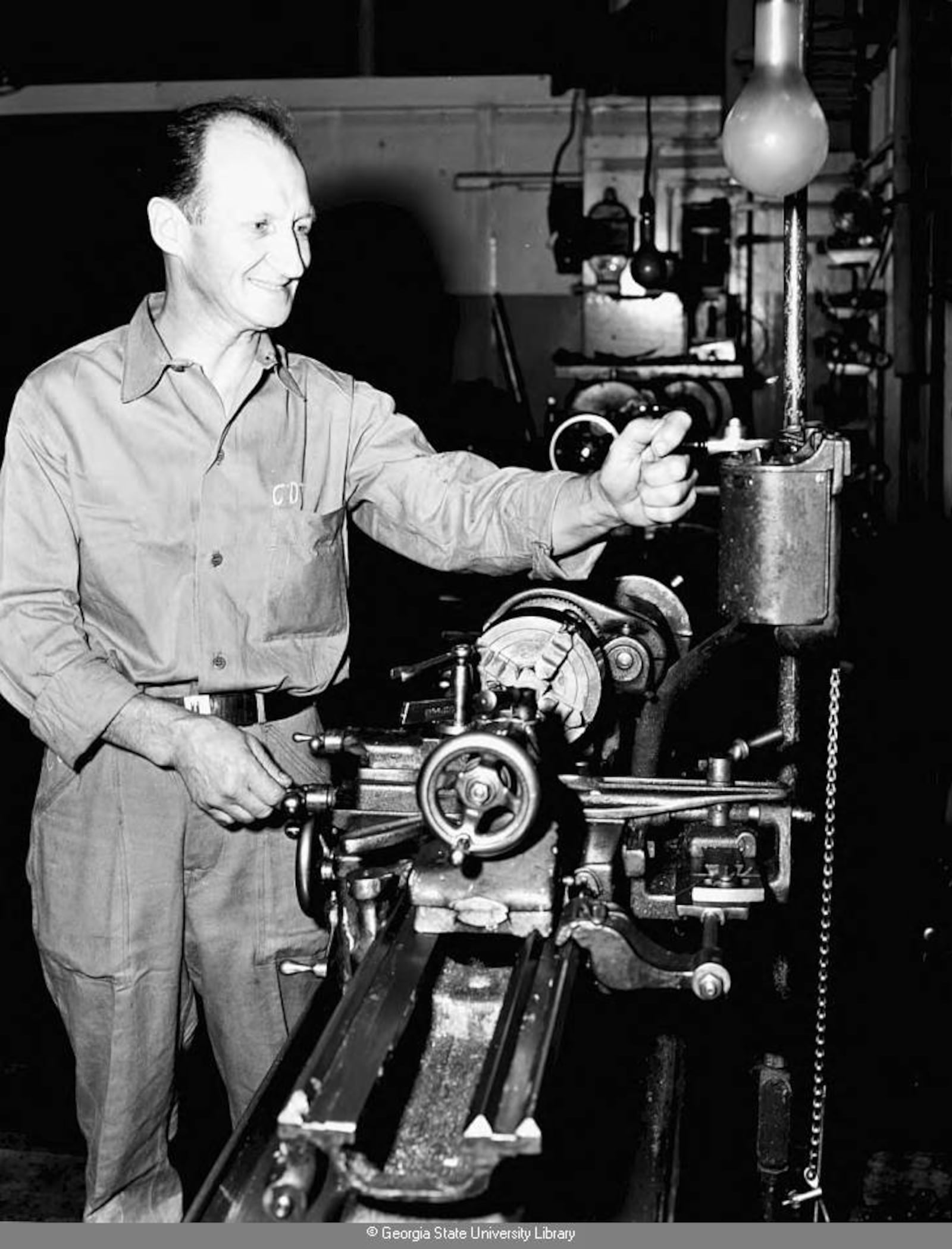 1952 -- An unidentified worker oversees production at the National Biscuit Company (later Nabisco) plant in southwest Atlanta. LANE BROS. PHOTOGRAPHIC COLLECTION / GSU