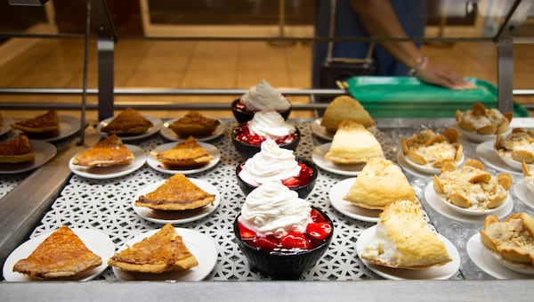 A selection of desserts is available in the display case at Magnolia Room. Martha Williams for The Atlanta Journal-Constitution
