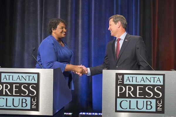 Democrat Stacey Abrams and Republican Brian Kemp, shown at a debate during Georgia's 2018 campaign for governor, could meet in a rematch next year. ALYSSA POINTER / THE ATLANTA JOURNAL-CONSTITUTION