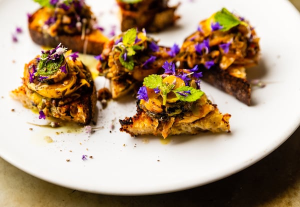 Zephyr zucchini bruschetta with pink lady peas, cabbage, pistou and spearmint at 8Arm. CONTRIBUTED BY HENRI HOLLIS