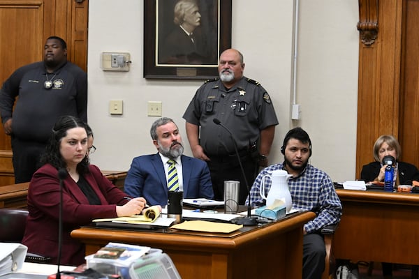 Jose Ibarra, right, accused of killing a Georgia nursing student earlier this year, listens through an interpreter as he sits with his attorneys during his trial at Athens-Clarke County Superior Court, Friday, Nov. 15, 2024, in Athens, Ga. (Hyosub Shin/Atlanta Journal-Constitution via AP, Pool)