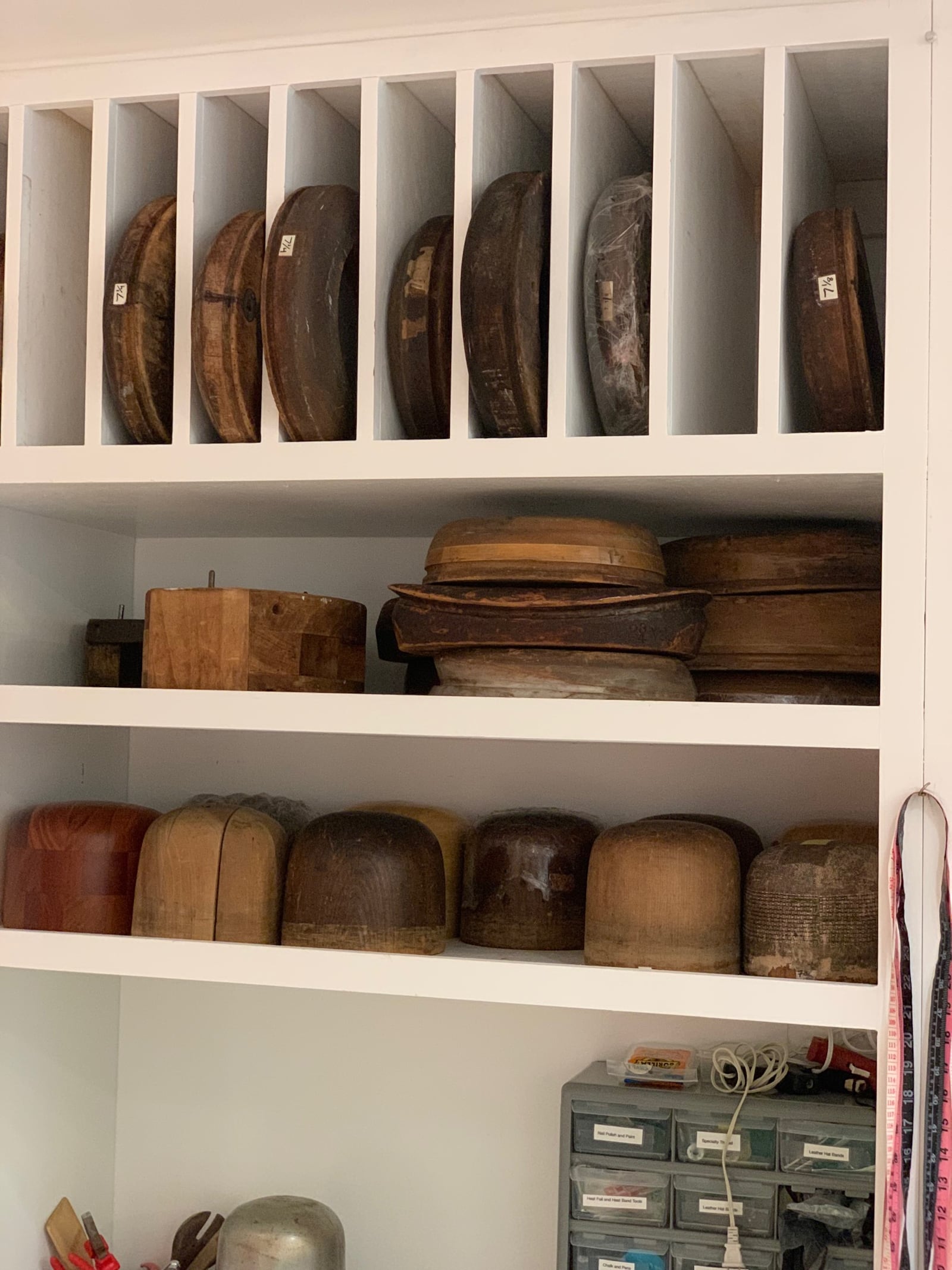 Brandon Franklin uses decades-old wood tools to craft his hats. Photo: Mary Welch for AJC