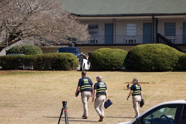 The GBI and local police agencies work at Cielo Azulyk Apartments, Friday, Feb. 23, 2024, in Athens, Ga. A University of Georgia spokesman said they were there for a person of interest in the death of Laken Riley, a 22-year-old nursing student that was found dead nearby on Thursday. (Jason Getz / jason.getz@ajc.com)