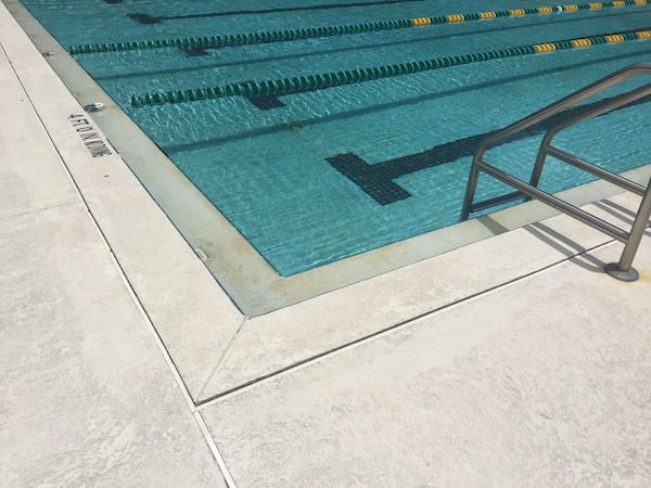 The Centers for Disease Control and Prevention said more people are reporting problems linked to a parasite called cryptosporidium, which can linger in pools or water playgrounds.