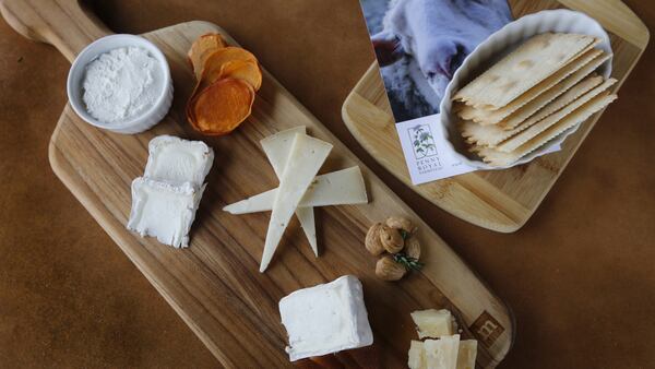 Guests can get a tasting sample of the many specialty cheeses as they also taste the many wines at the Penny Royal Farmstead in Boonville, Calif., on December 15, 2016. (Laura A. Oda/Bay Area News Group/TNS)